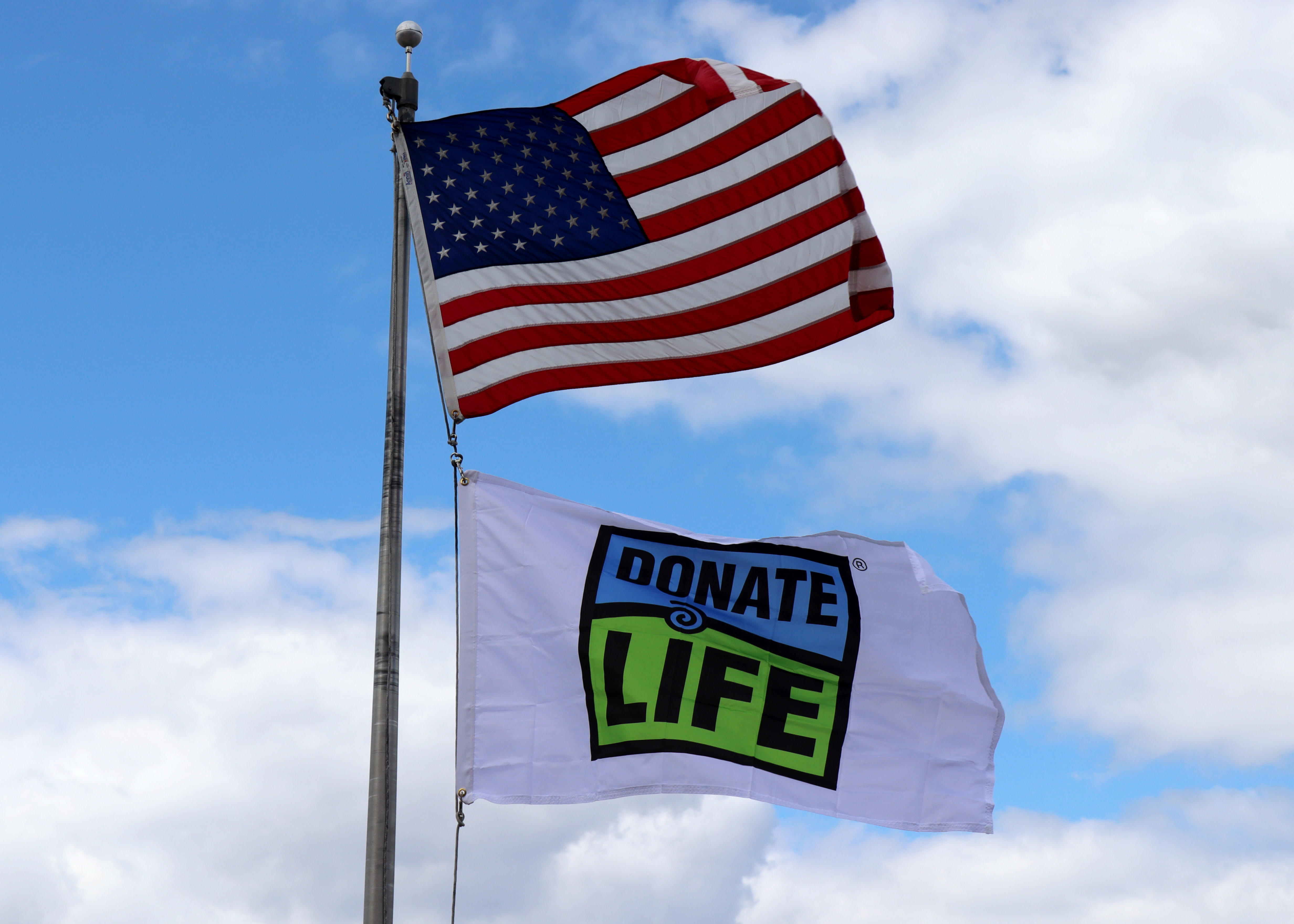 Mile Bluff raises Donate Life flag during Pause to Give Life event